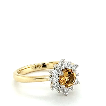 Yellow Gold Engagement Ring With Pear Shaped Diamonds surrounding the Yellow Diamond In The Centre