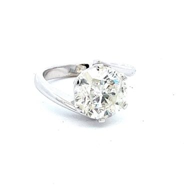 Twist Engagement Ring with a Round Diamond